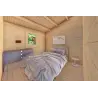 Maison en bois isolée IRMA 6x6, 44/100/44 mm, intérieur chambre principale
